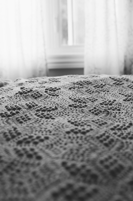 Crocheted blanket and curtain