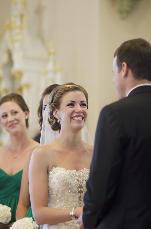 Bride smiling at groom