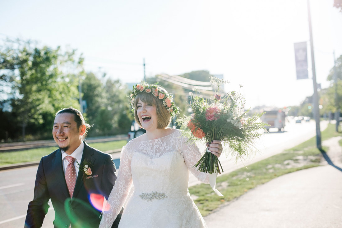 bride and groom laughing in toronto